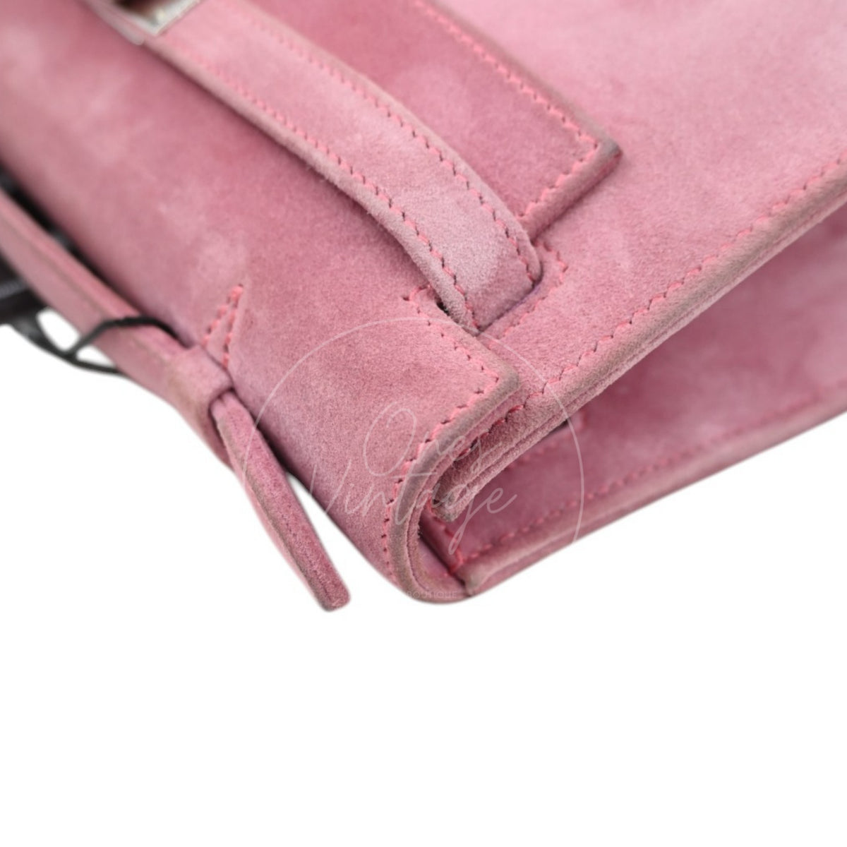 Hermès Kelly Pochette Veau Doblis in pink suede, reinforced handle attachment and metal handle ring detail