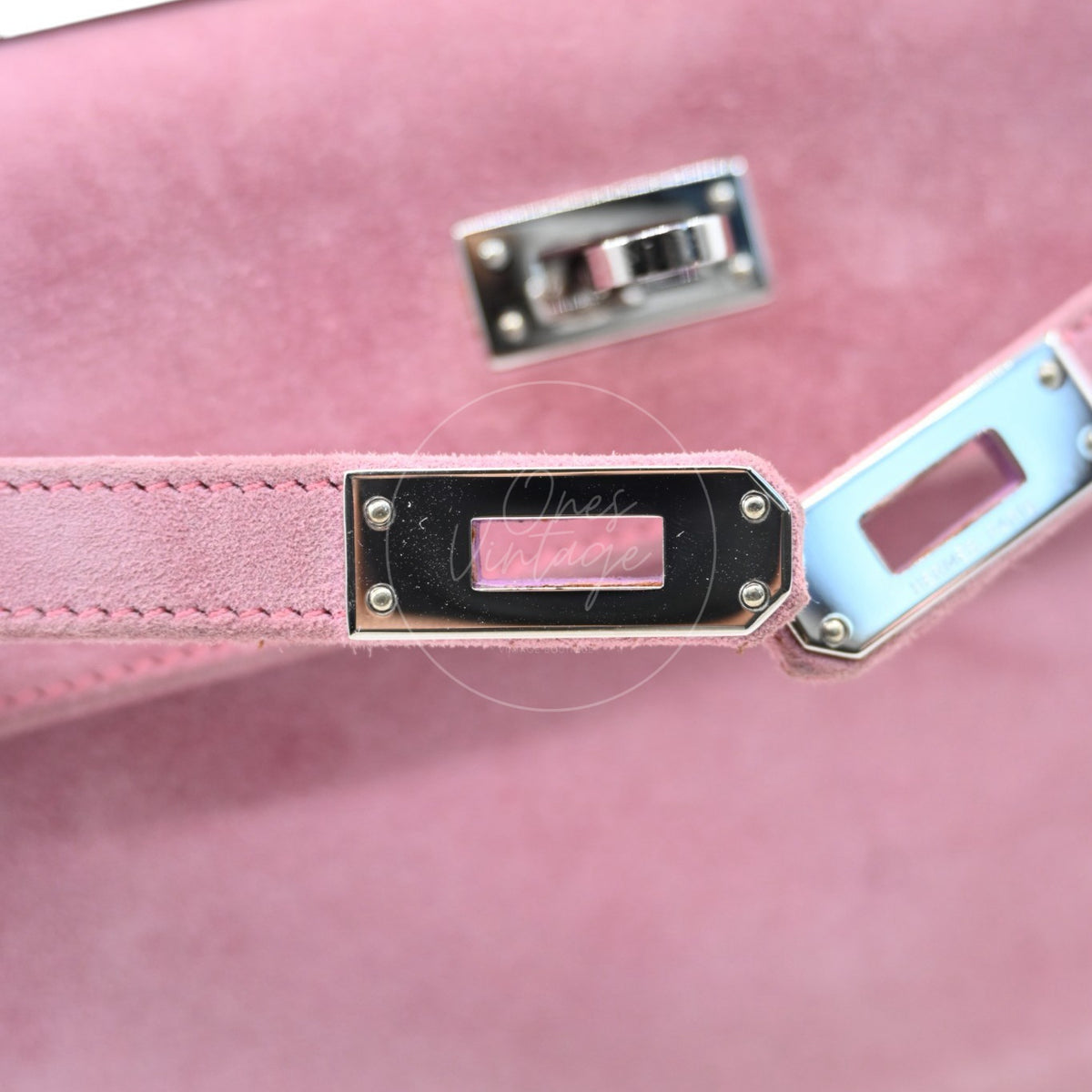 Hermès Kelly Pochette Veau Doblis in pink suede with palladium hardware, rectangular turn-lock closure and corner screw detailing