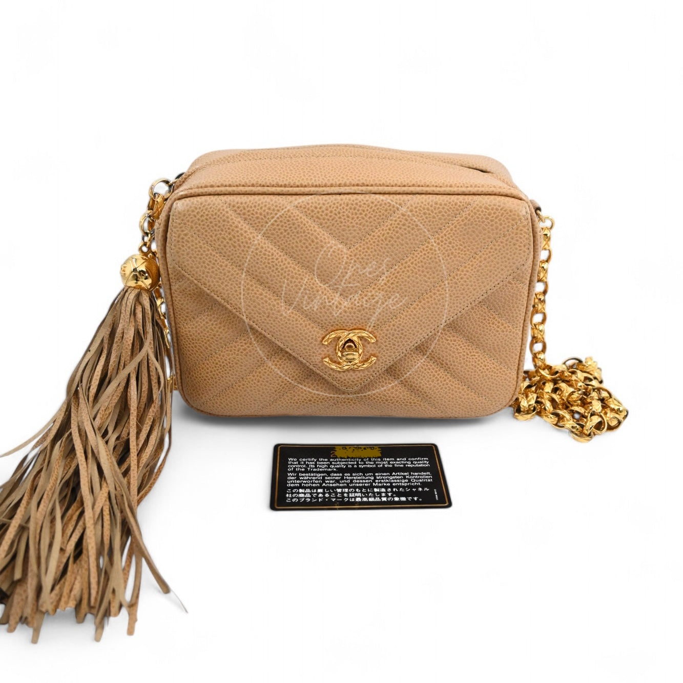 [Pre-owned] Chanel Beige Caviar V Stitch Fringe Mini Camera Bag