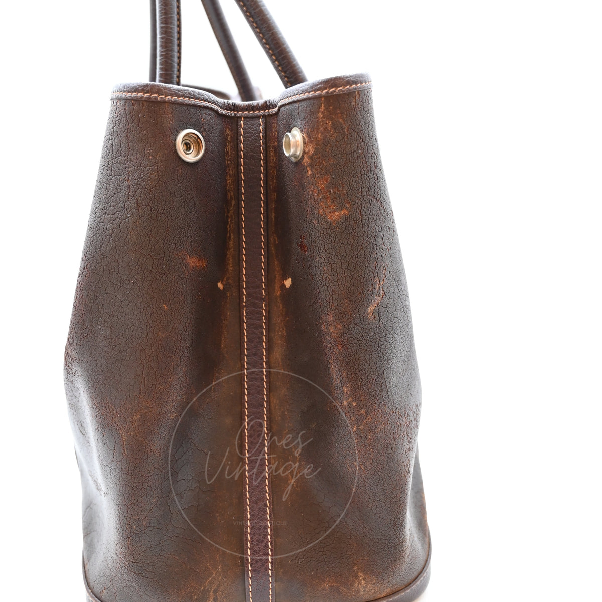 Hermès Garden Party 36 Amazon tote in dark brown rubber with leather trim, opposite side panel with textured patina