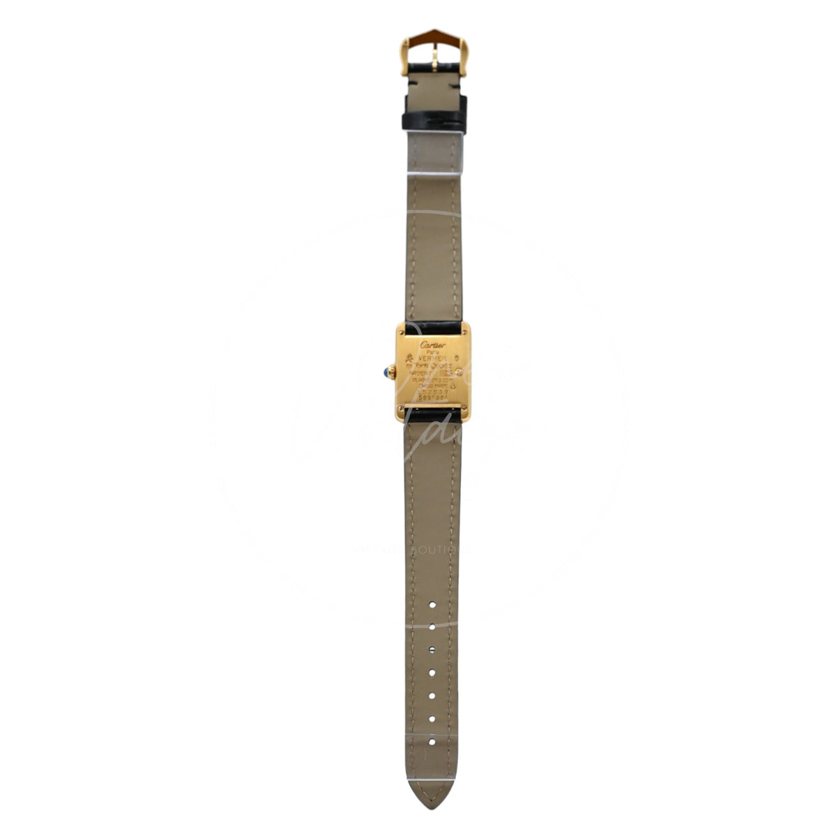 Cartier Must de Tank Trinity dial quartz watch with black leather strap, full rear view showing engraved case back and beige lining