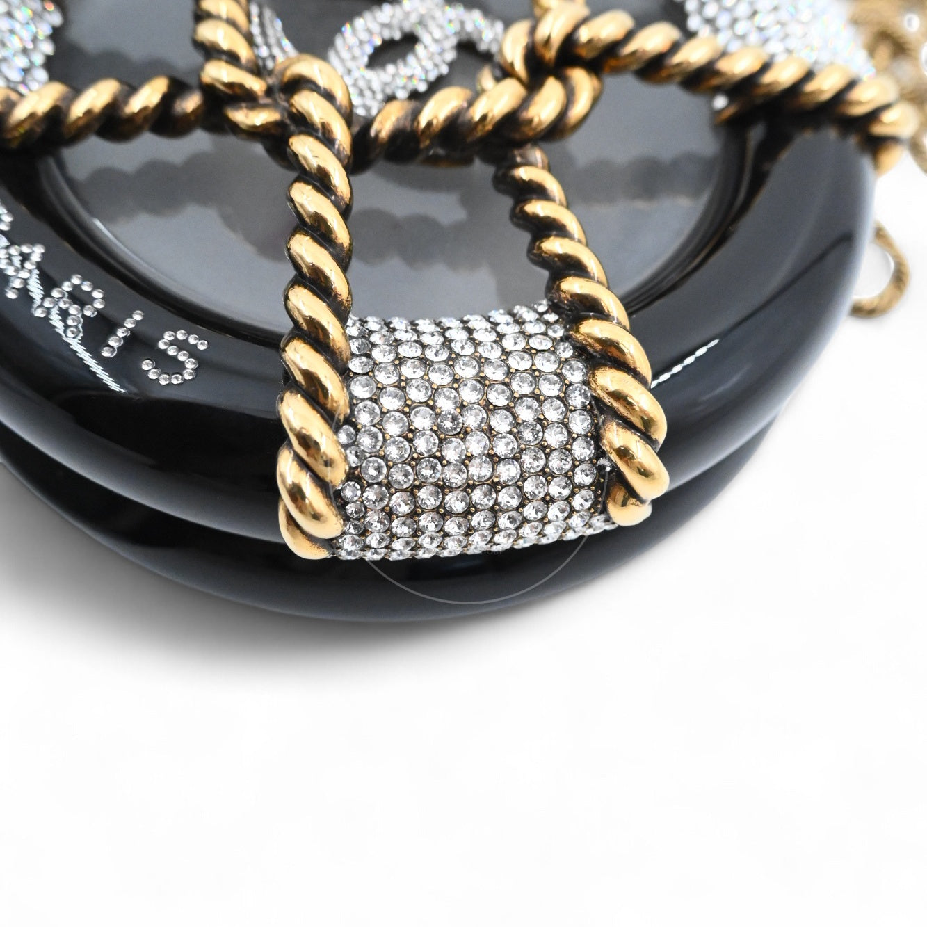 [Pre-owned] Chanel Rescue Wheel Black Resin GHW Series 25 Minaudiere Evening Bag