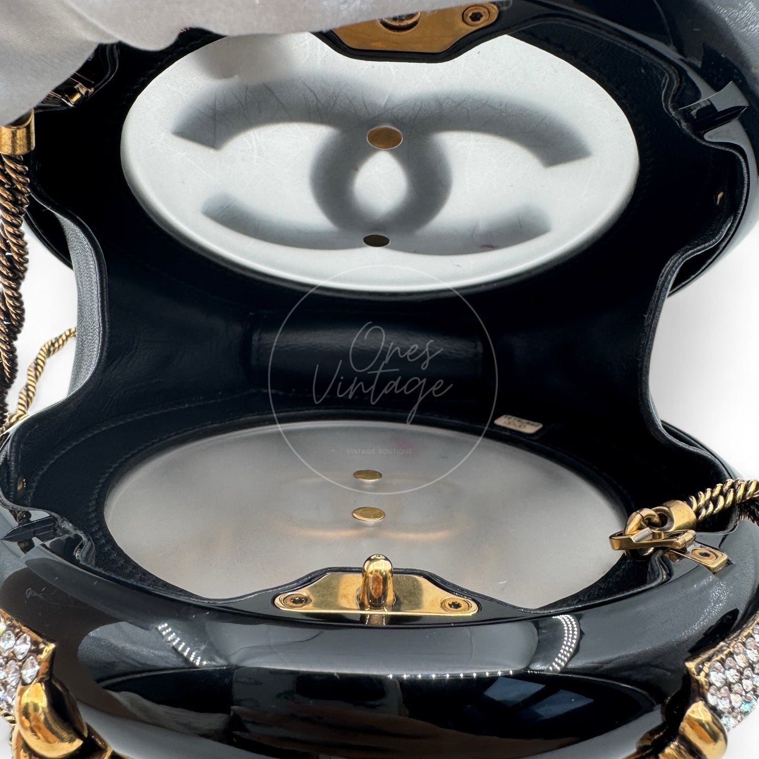 [Pre-owned] Chanel Rescue Wheel Black Resin GHW Series 25 Minaudiere Evening Bag