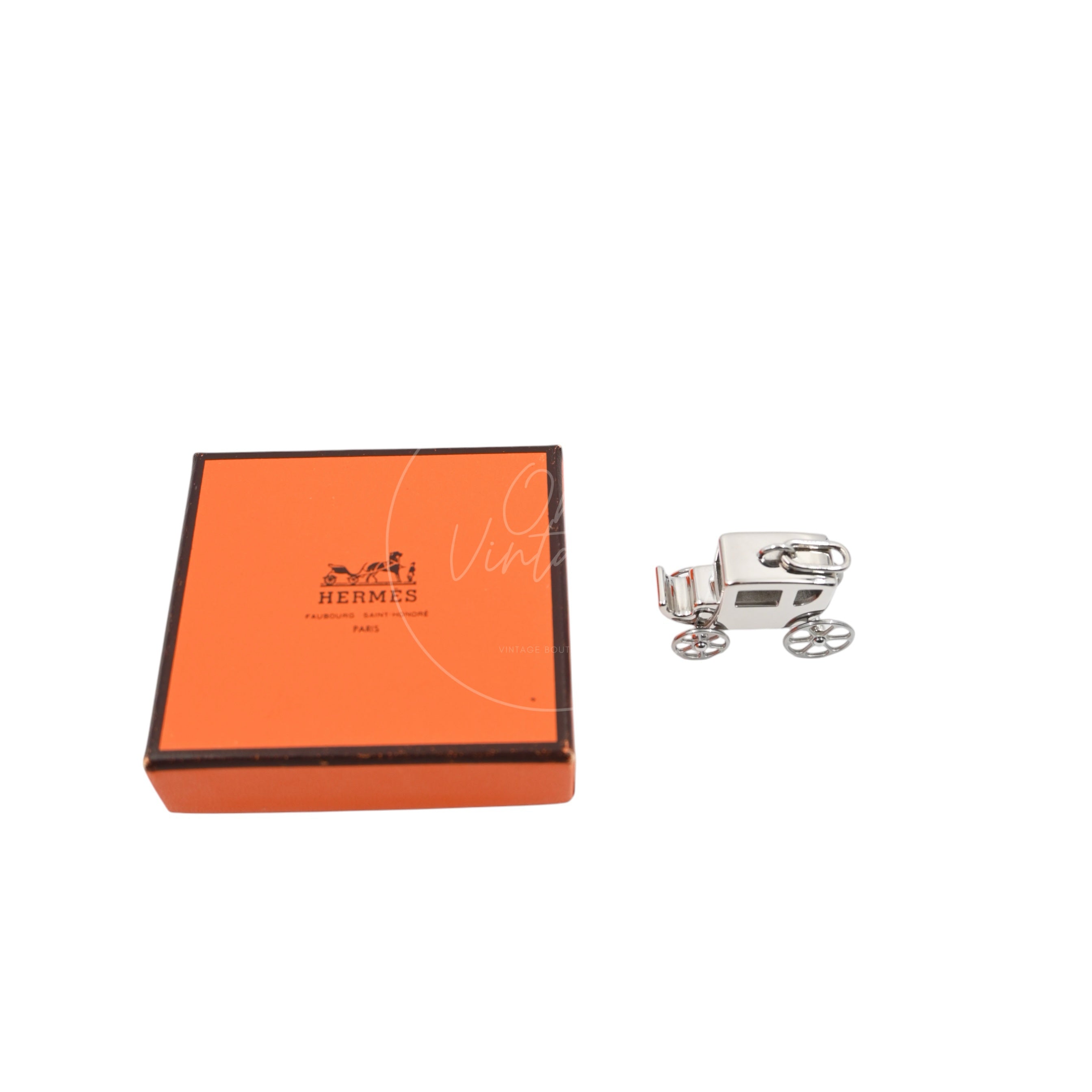 [Pre-owned] Hermes Hermes Silver and Palladium Caleche Carriage Curiosite Curiosity Charm Pendant